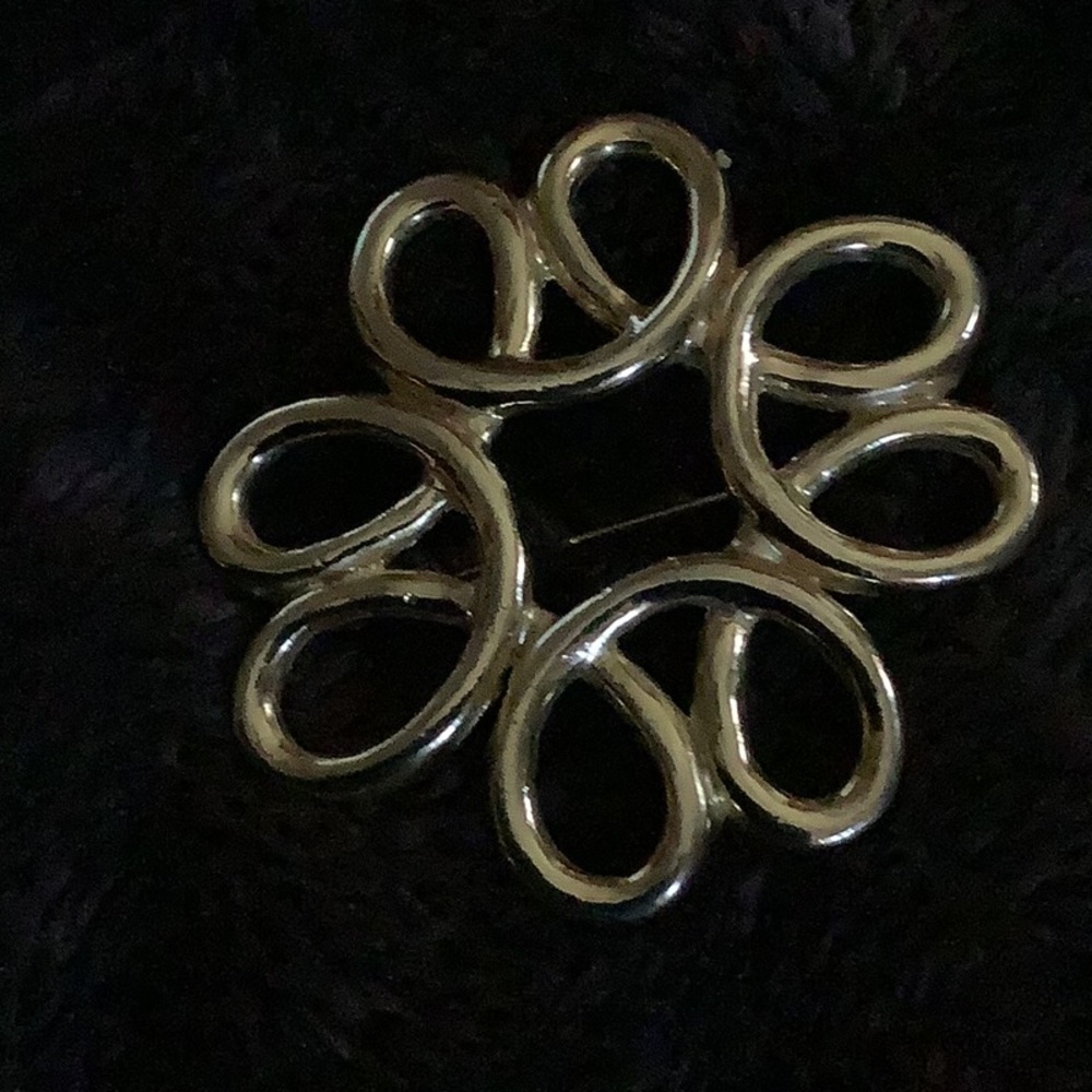 Sfj signed goldtone brooch